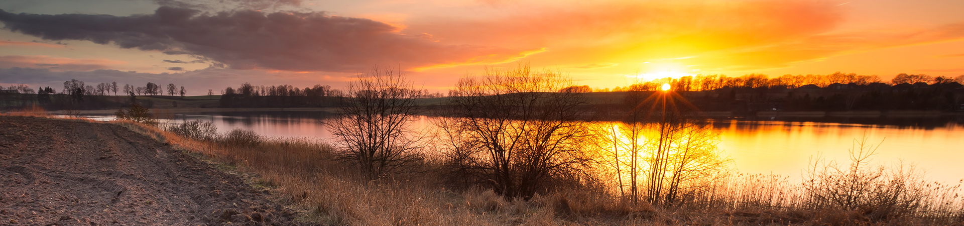 Lake near field after sunset