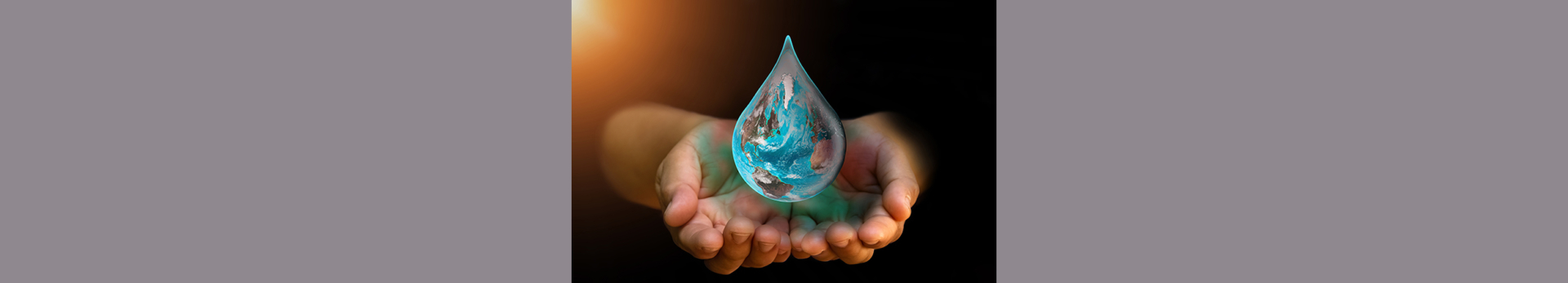 Graphic designed water droplet with earth embedded inside it. Open hands holding the droplet